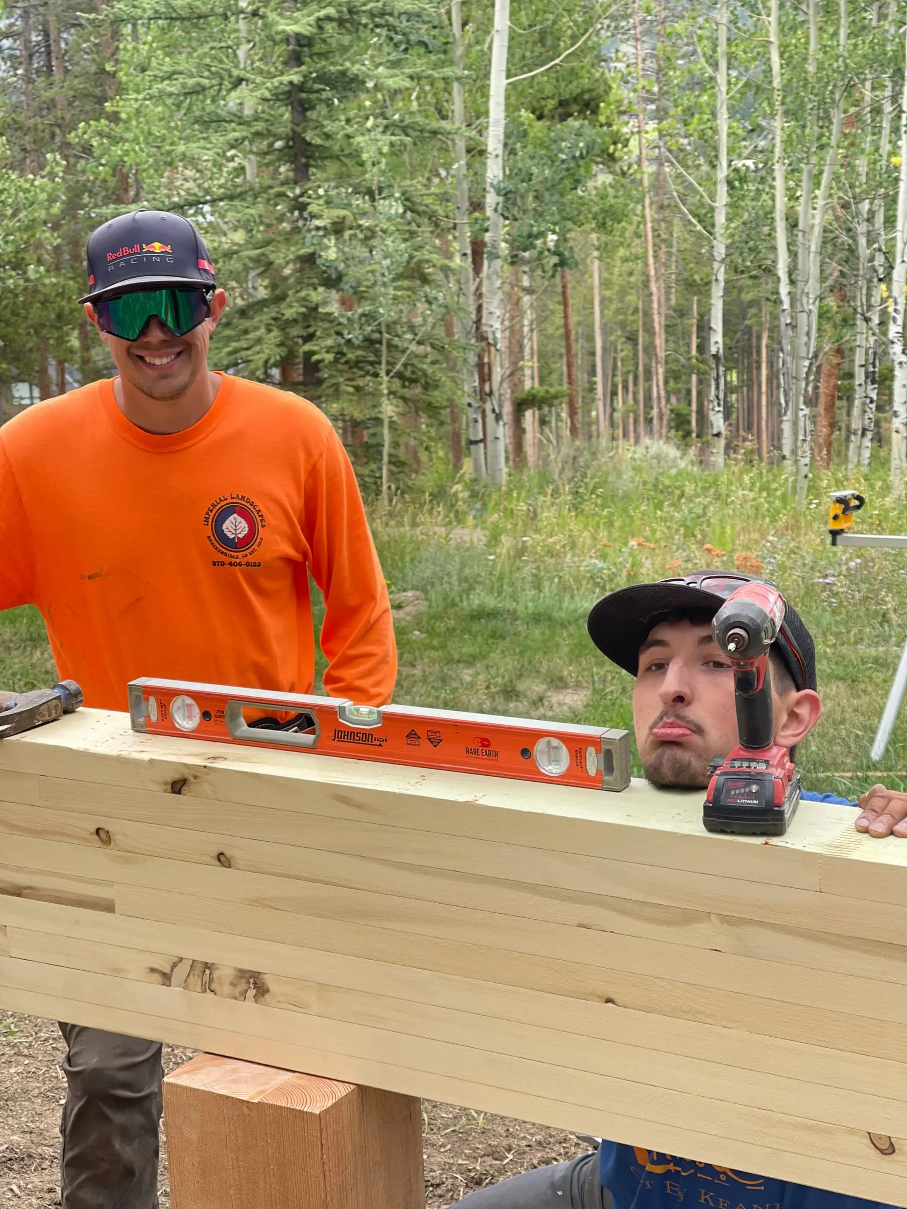 Imperial Landscapes crew checking grade on a Summit County jobsite
