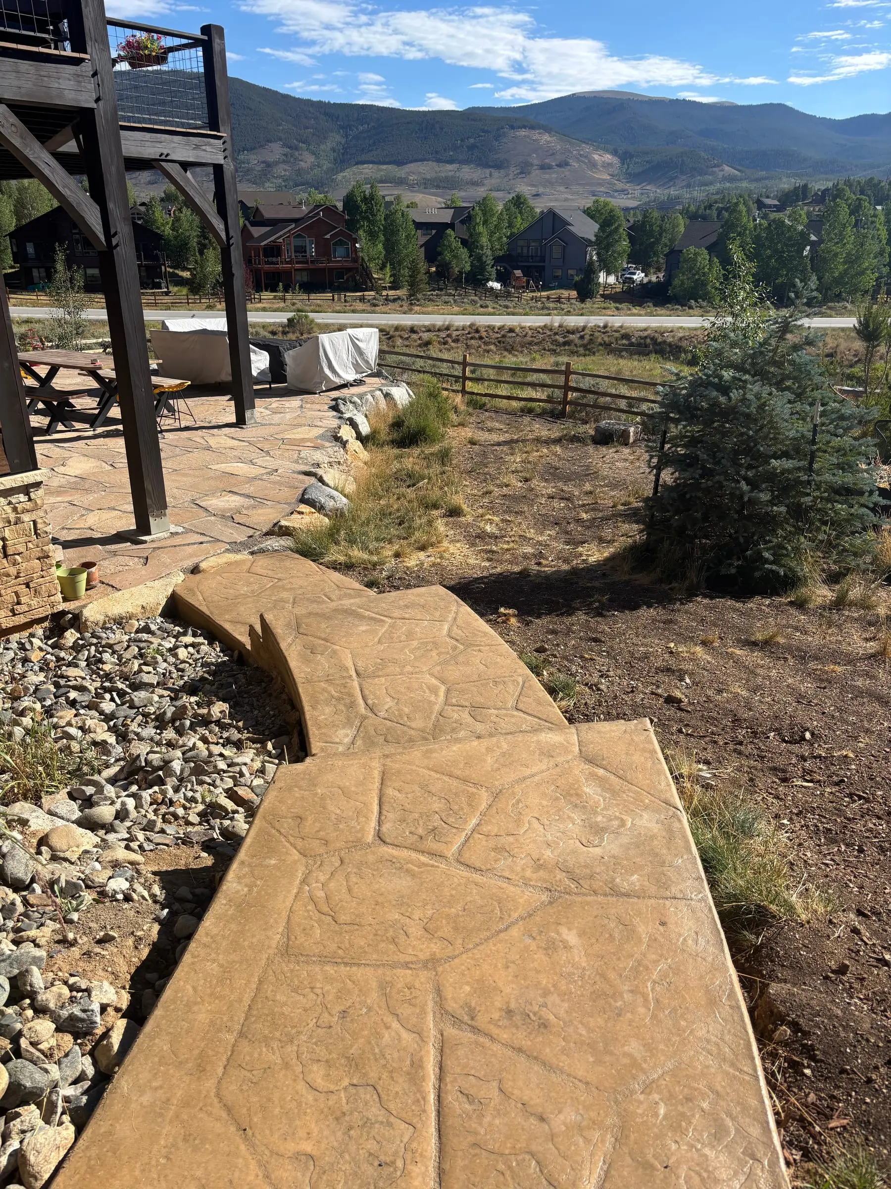 Stone walkway and native landscape installation with a Tenmile Range view